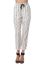 Load image into Gallery viewer, Cream Pants With Contrast Geo-Tribal Print